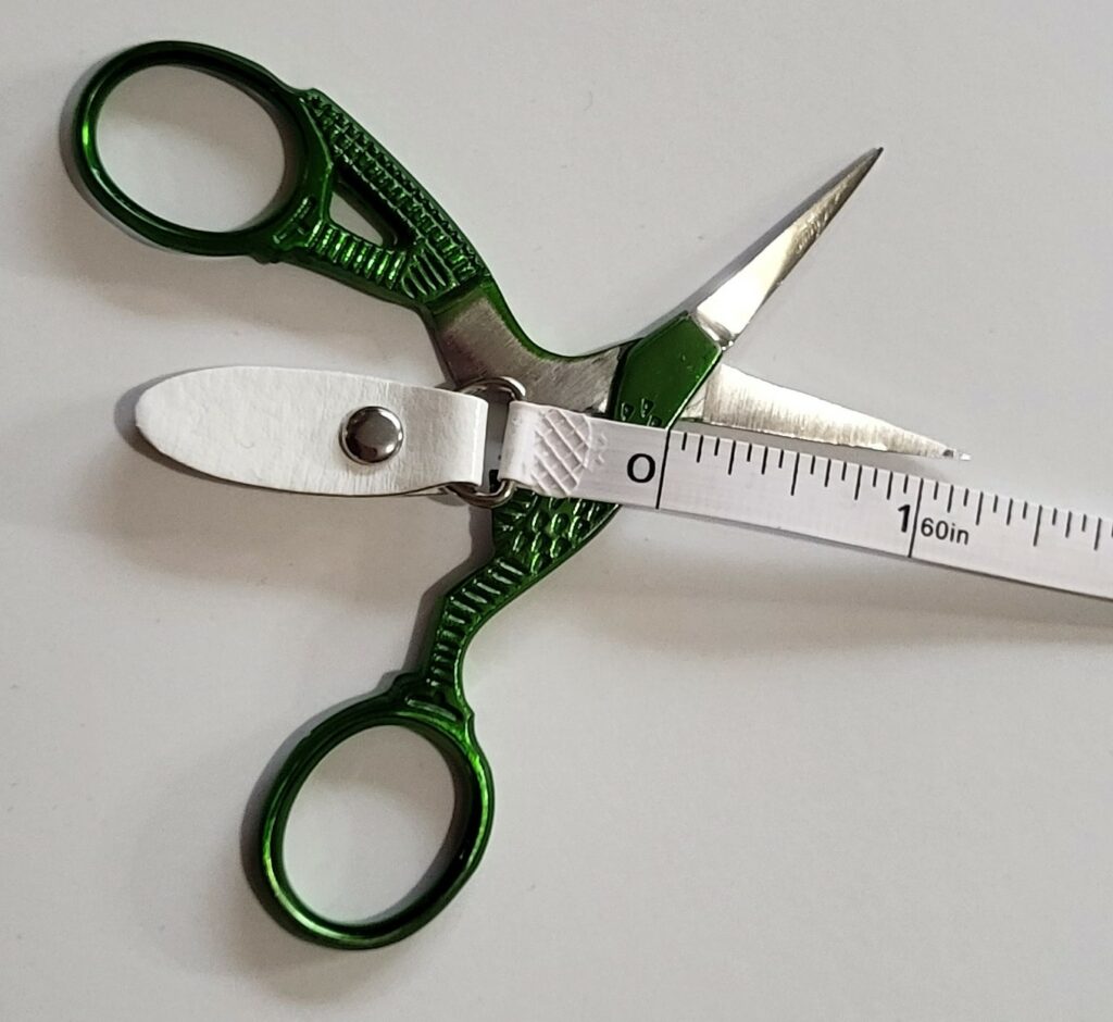 measuring scissor blade length for tsa