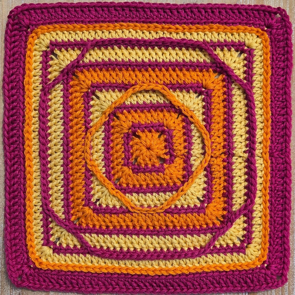 Geometric eye crochet square with stripes and surface slip stitch